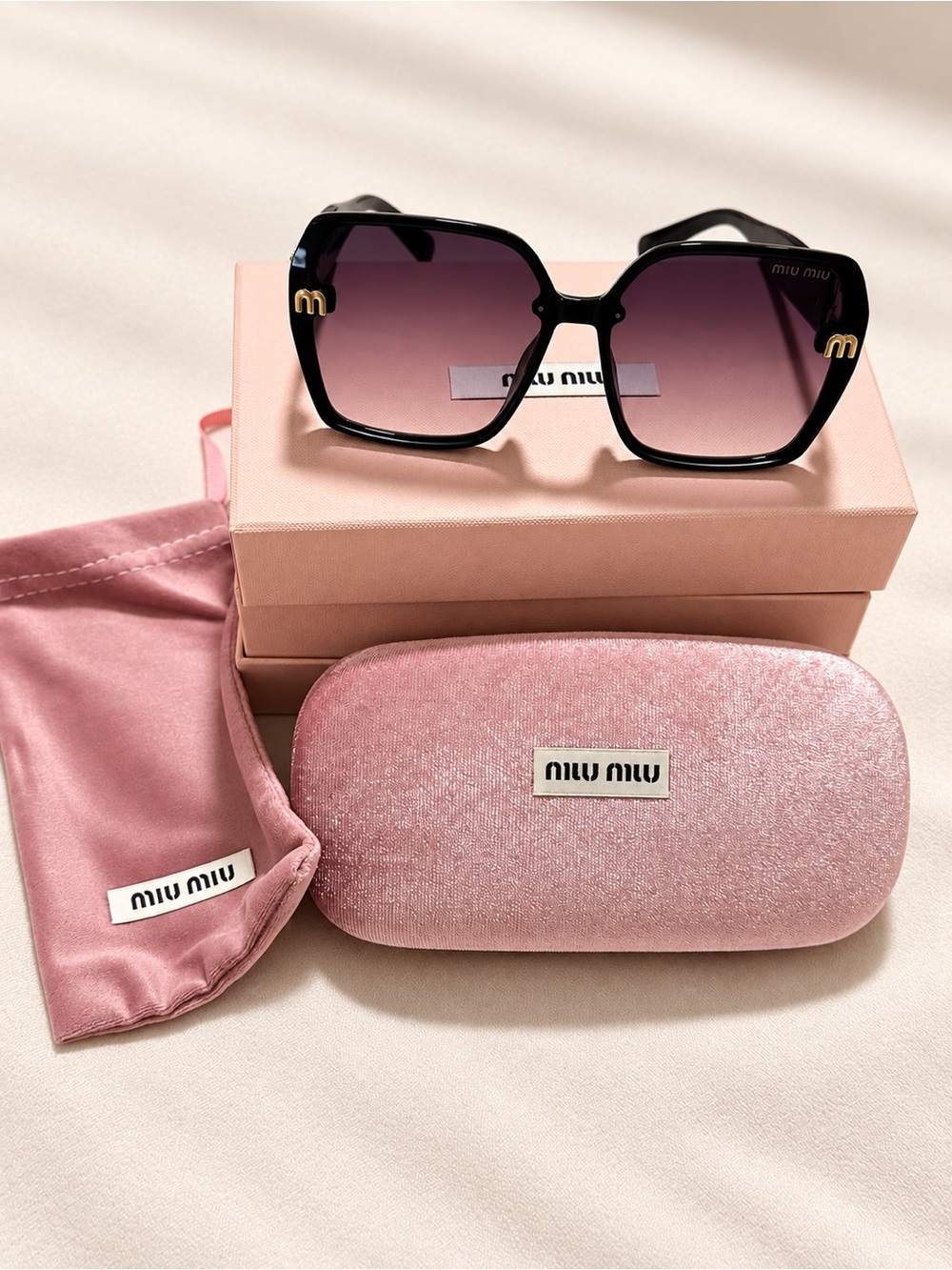 Miu Miu Black Frames with Pink Gradient Lenses Sunglasses